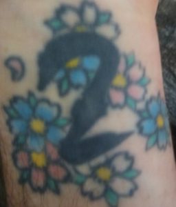 Tattoo of self/cherry blossoms. Hate myself love myself.
