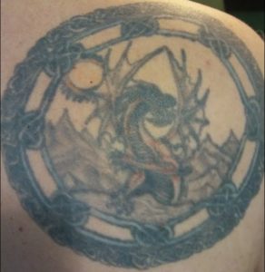 Dragon coming over a mountain / Celtic Knots Tattoo / James Vaugn Tattoo