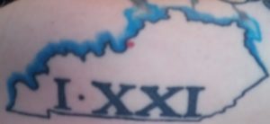 Kentucky and Roman 1:21 Tattoo