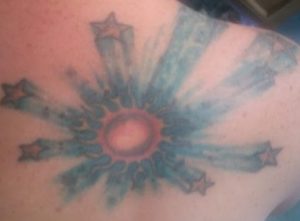 Bursting Sun Tattoo / Lacie Frain Phoenix Tattoo