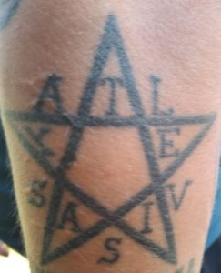 Latin Pentagram Tattoo