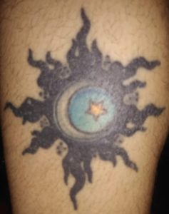 Crescent Moon and Dark Star tattoo