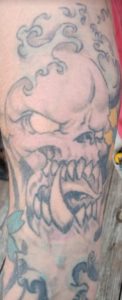 Skull with Flower Tattoo