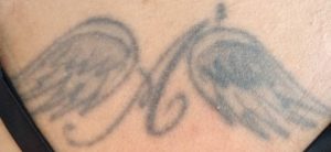 A to the 3rd power with angle wings tattoo