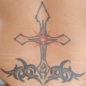 Cross with tribal tattoo