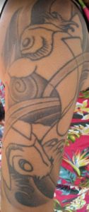 Coy fish sleeve tattoo