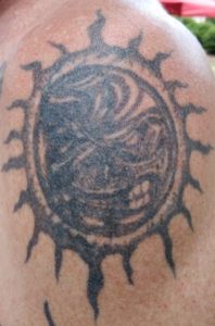 Grim reaper sun tattoo