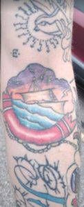 Sinking ship tattoo