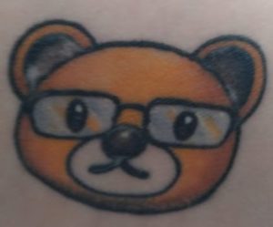 Teddy bear tattoo