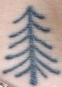Evergreen tree tattoo