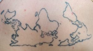 World map upside down tattoo