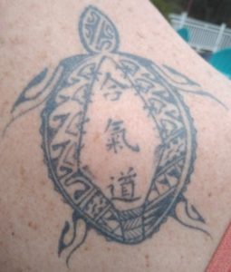 Turtle with Kanji tattoo