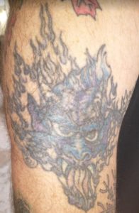 dragon with a yin and yang tattoo