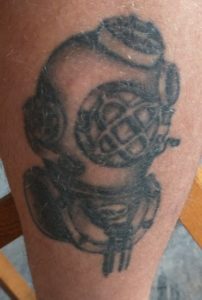 Marka or Mark V dive helmet tattoo