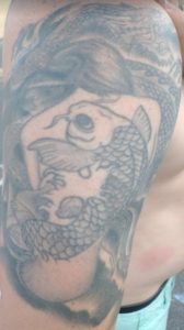Dragon woman and coy fish tattoo