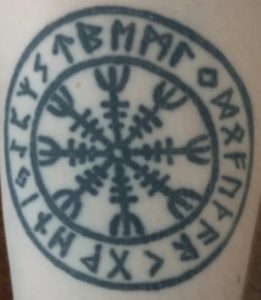 Helm of Awe and Norse Rune Circle tattoo