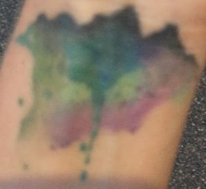 Watercolor mountains tattoo