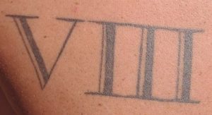 Roman numeral 8 tattoo